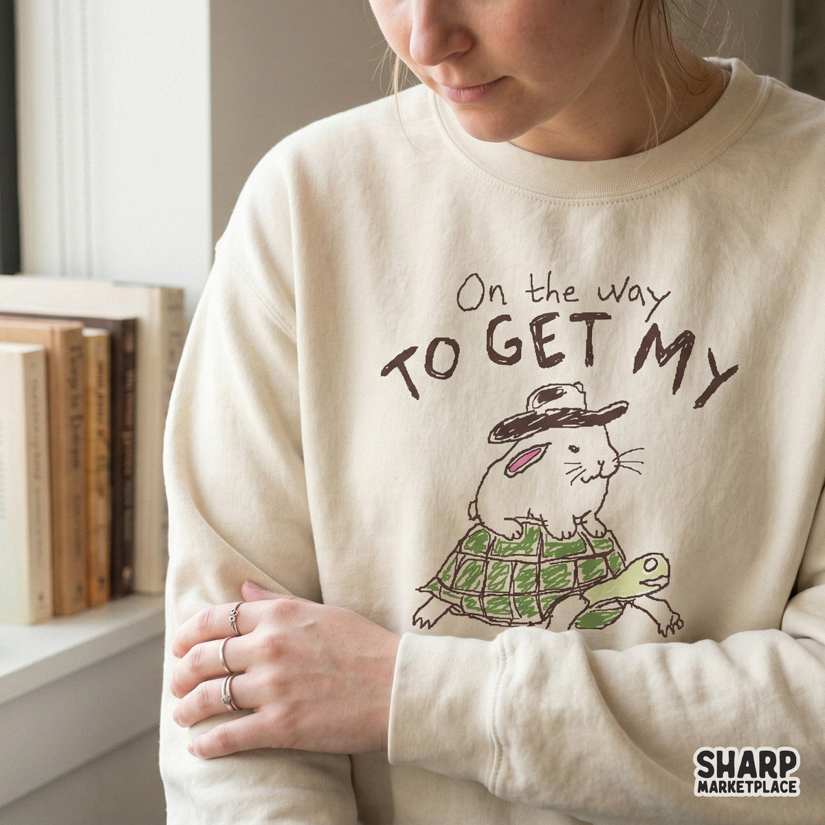 Funny animal art PNG featuring a rabbit hitching a ride on a turtle, perfect for DIY adult humor shirts, mugs, and creative print projects.