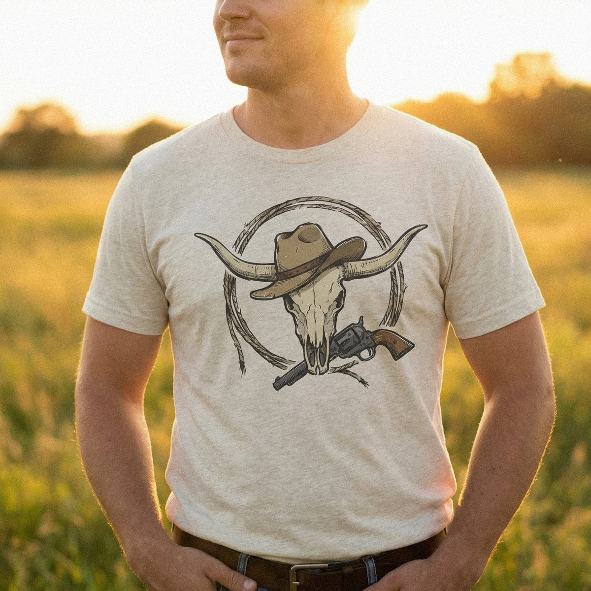 Hand-drawn western cowboy skull graphic with a longhorn steer, rancher hat, and revolver, perfect for custom ranch decor and wild west shirt prints.