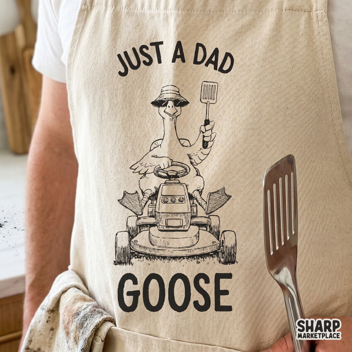Funny animal meme design featuring a silly goose on a lawnmower for a Father's Day sublimation shirt
