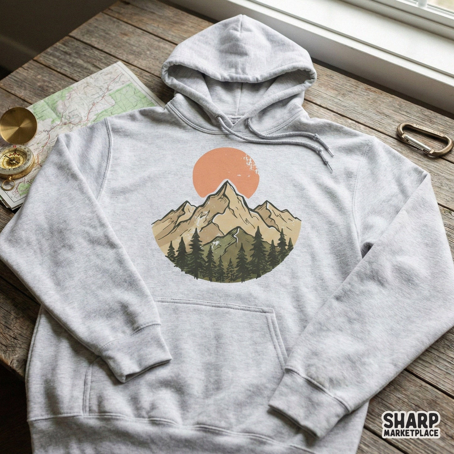 Nature-inspired mountain adventure graphic with a muted sunset and pine forest, suitable for custom t-shirt printing, tumblers, and outdoor themed crafts.