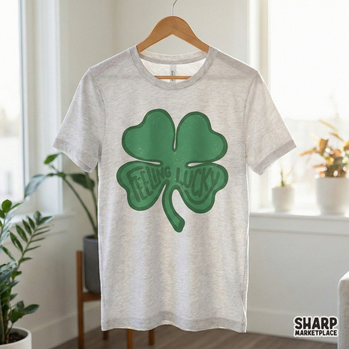 Vintage style four-leaf clover digital graphic with rustic texture and Feeling Lucky lettering, suitable for stickers, tumblers, and festive decor.