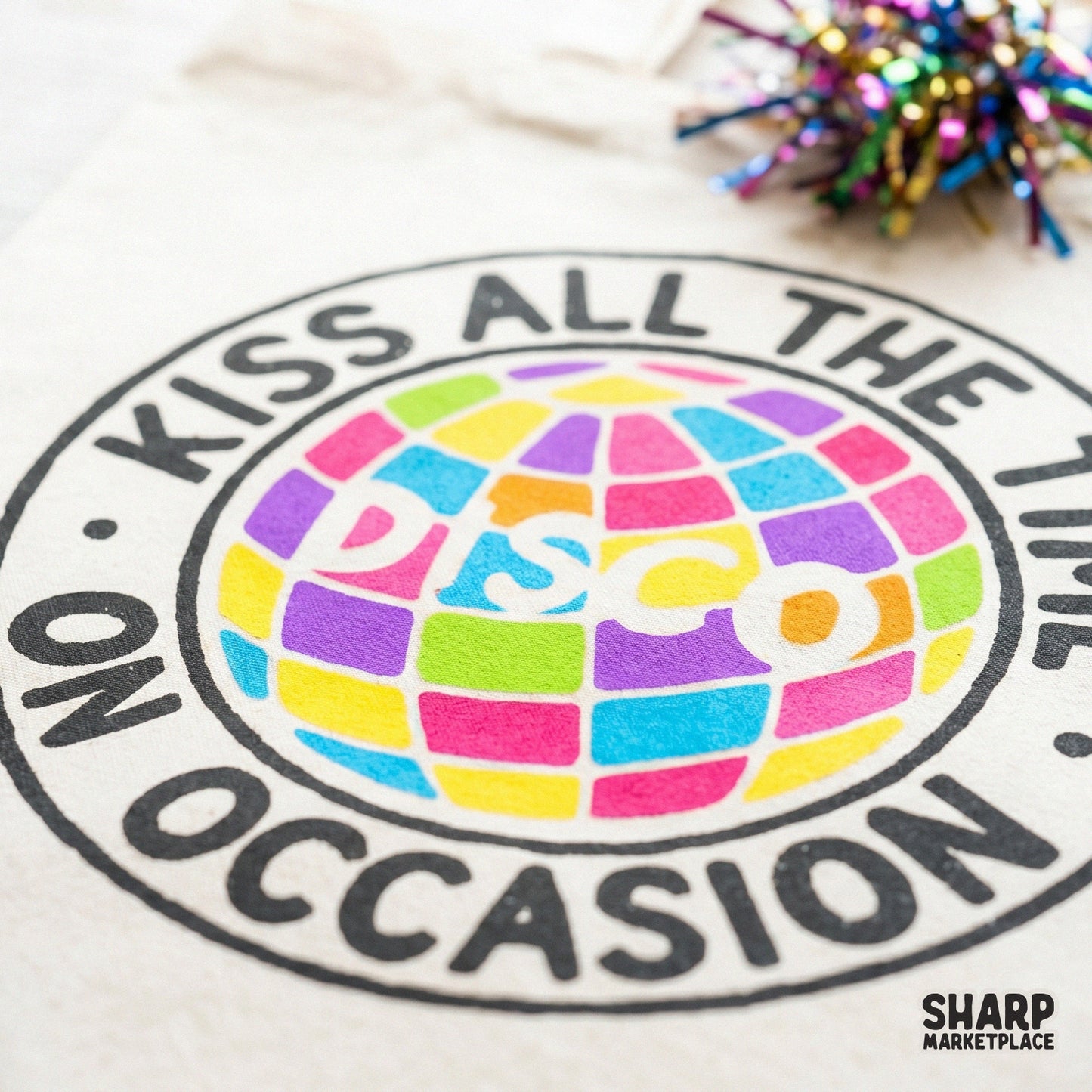 Colorful disco ball badge design with distressed block lettering for nostalgic apparel, wall art, and creative print-on-demand merchandise.