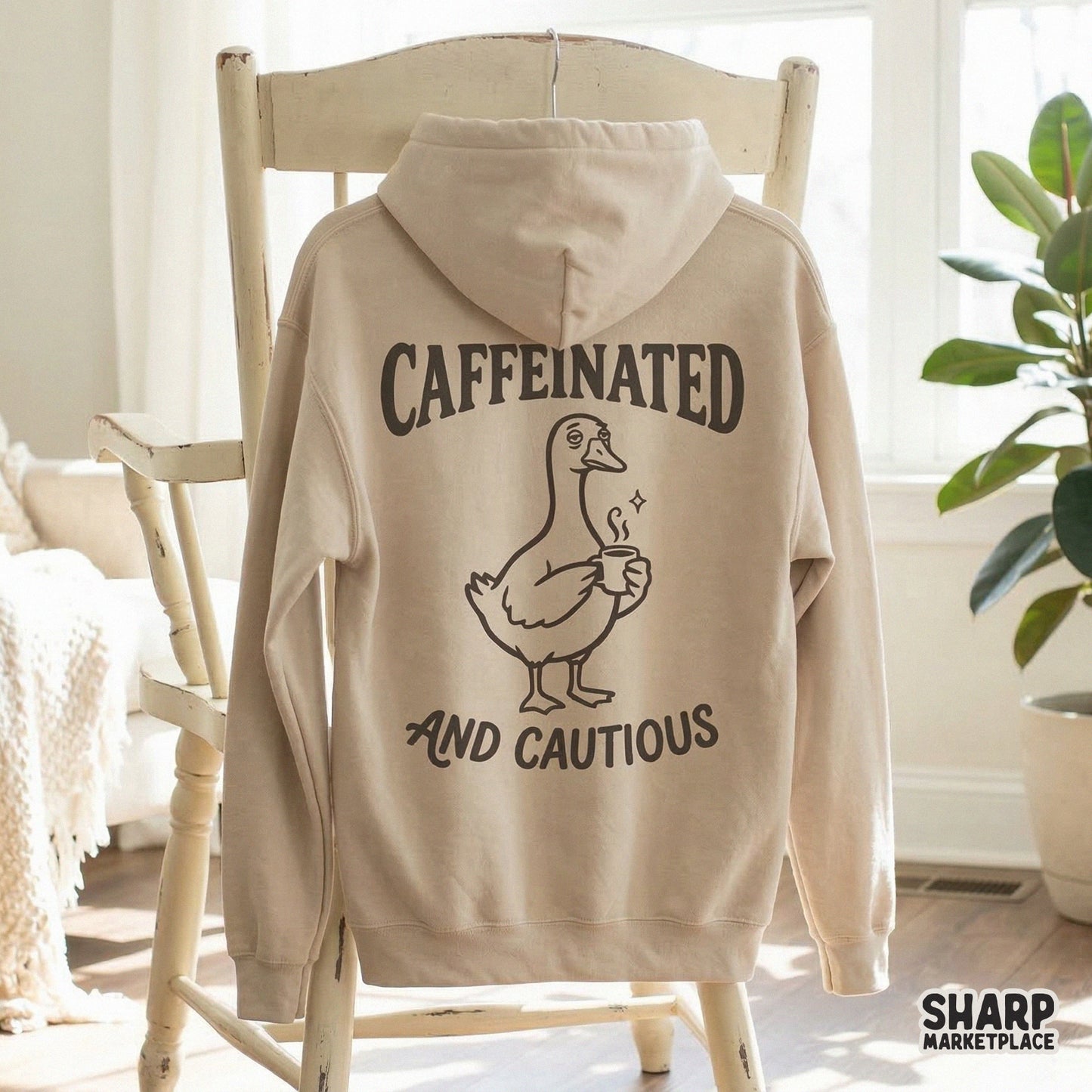 Funny coffee-themed digital download featuring a cartoon duck with a steaming mug and the text Caffeinated and Cautious for DIY stickers or shirts.