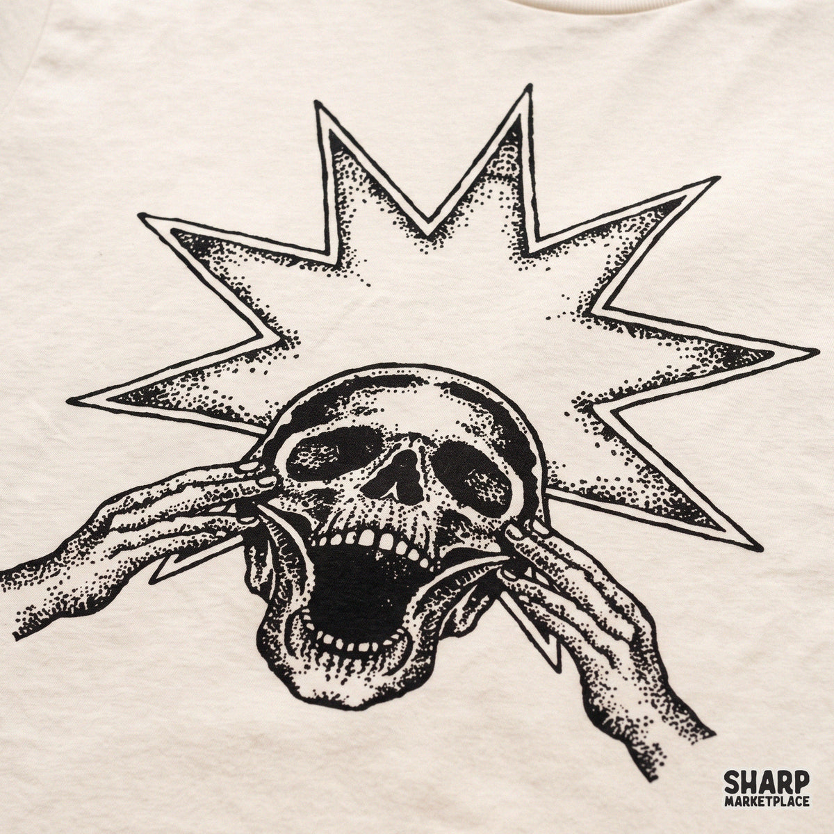 Screaming skeleton with starburst background retro halloween shirt design for trendy spooky season apparel