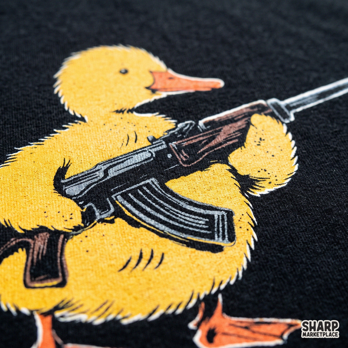 Cute duckling holding a rifle in a funny tactical bird hunting PNG graphic for t-shirts and apparel