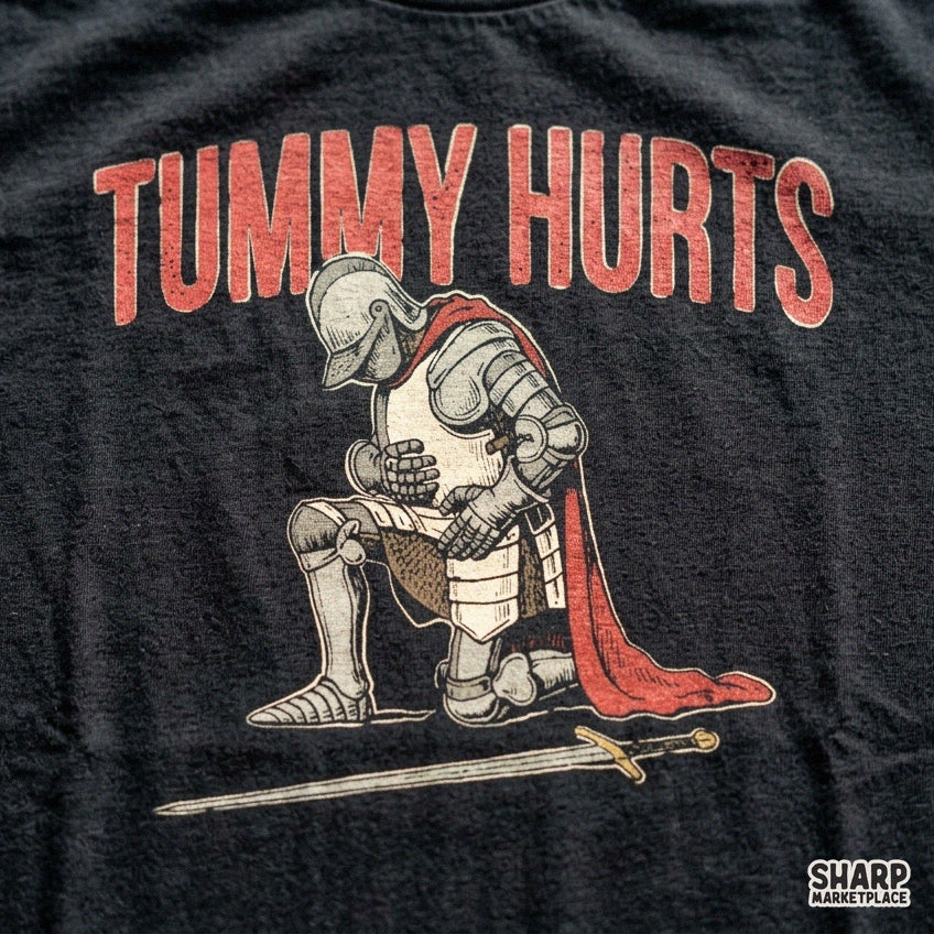 Funny medieval knight leaning on sword tummy hurts meme graphic, perfect sarcastic PNG design for t-shirts and apparel