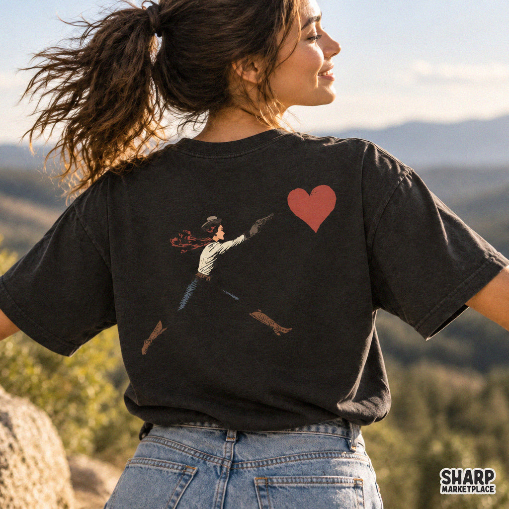 Sarcastic western cowgirl shooting a giant red heart illustration for trendy Valentine PNG t-shirt designs
