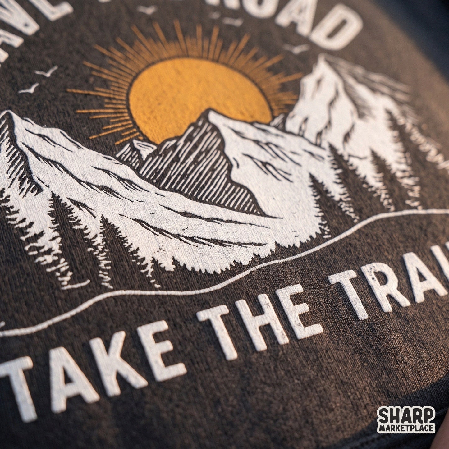 Retro mountain sunrise adventure design with leave the road take the trails text for summer camping and hiking apparel