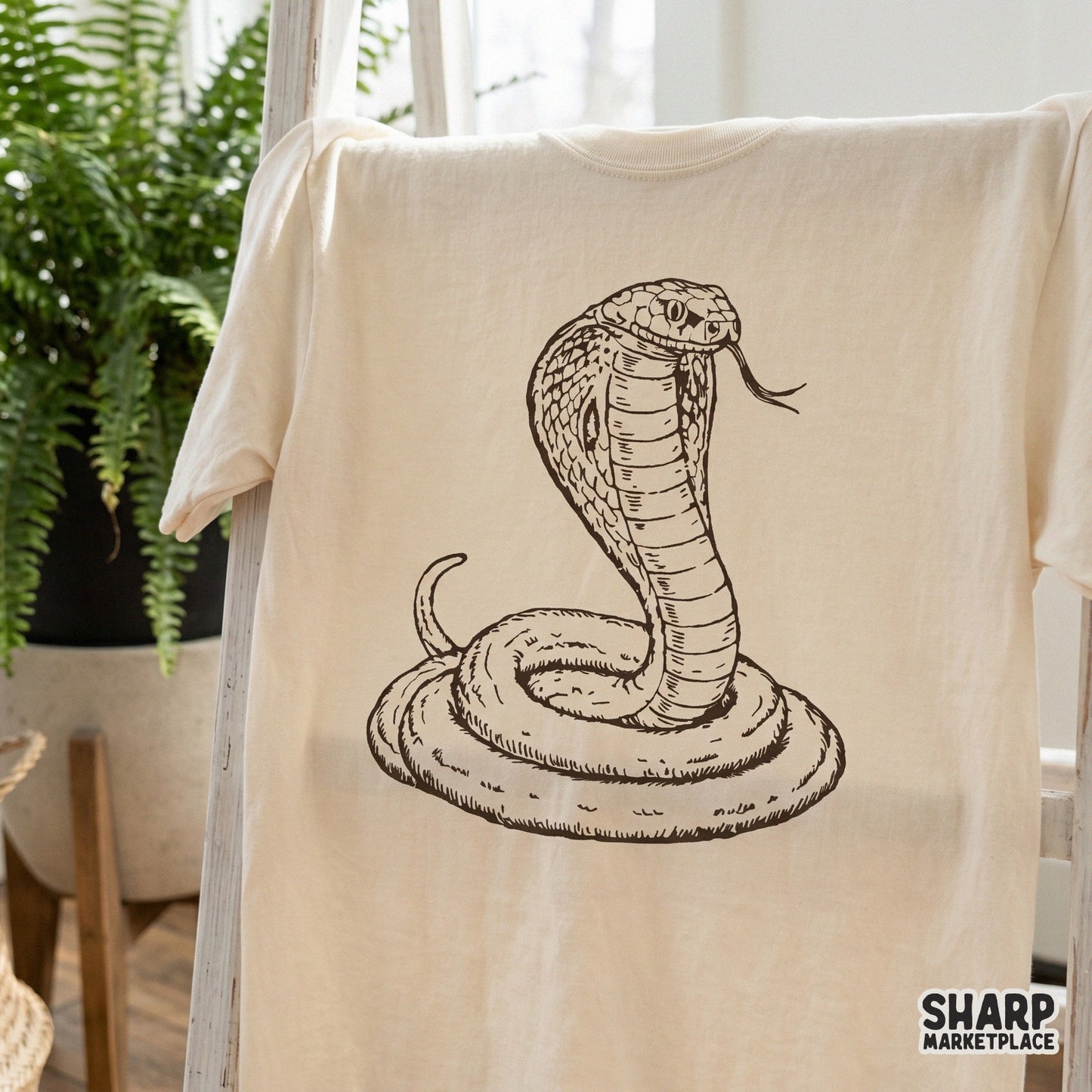 Vintage coiled king cobra snake with open hood tattoo graphic for Halloween shirt design