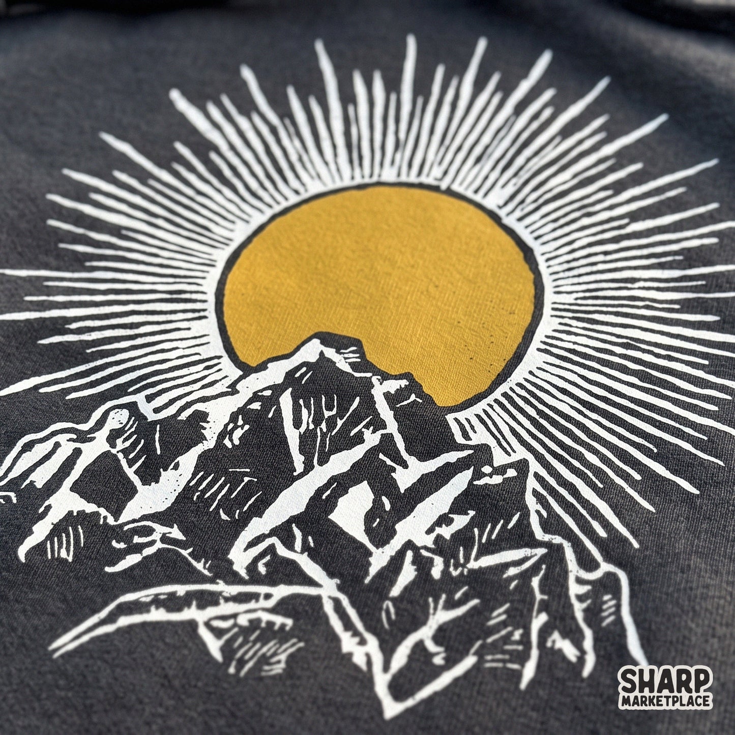 Linocut sunburst over mountain peak vintage woodblock landscape art for western shirts and sublimation prints
