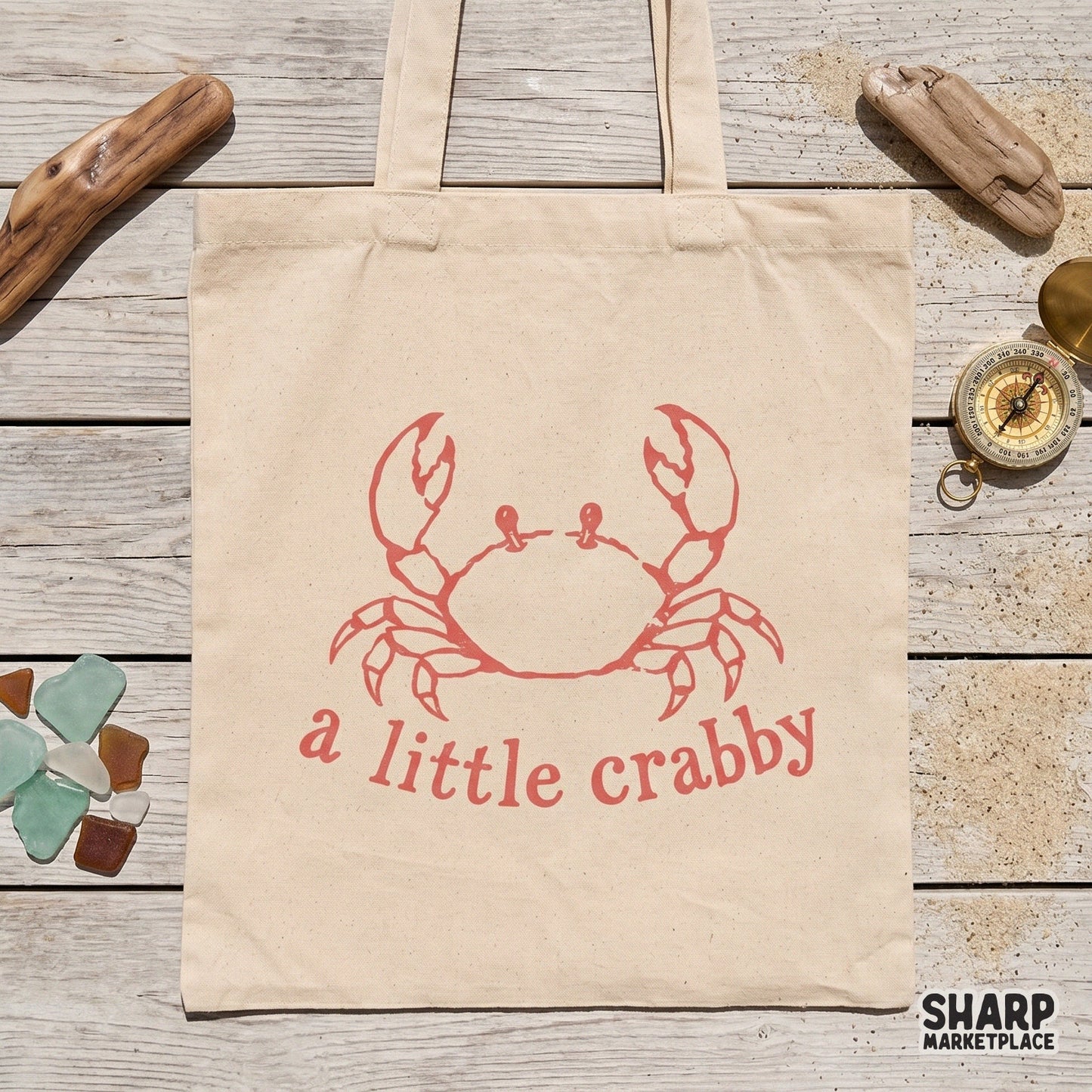 Funny beach-themed digital artwork featuring a red crab and the text a little crabby, optimized for print-on-demand shirts and summer accessories.