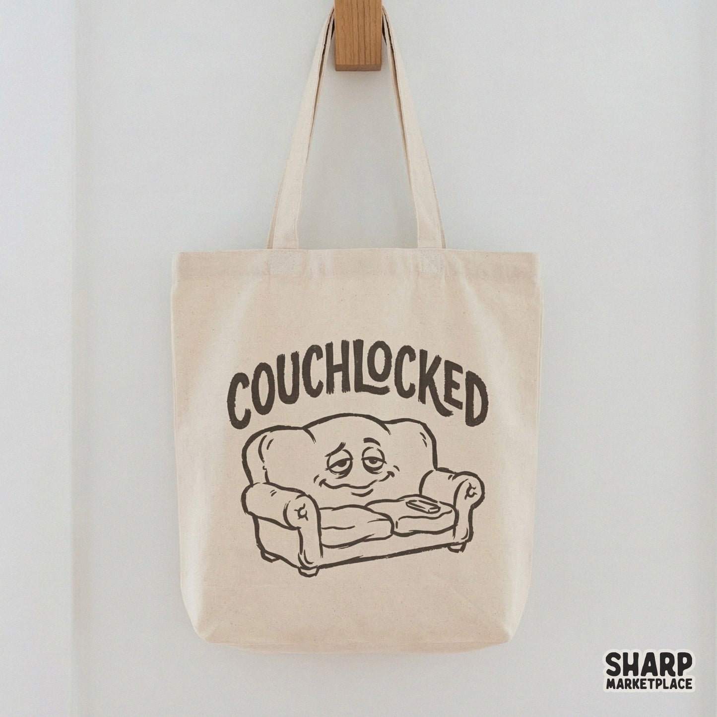Monochromatic graphic of a stoned sofa character with arched typography, suitable for DTF printing, heat transfers, or DIY streetwear shirt projects.