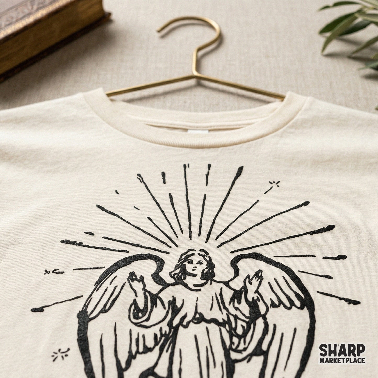 Monochromatic spiritual angel design with delicate star accents, suitable for DIY heat transfers, DTF printing, and faith-inspired apparel crafts.