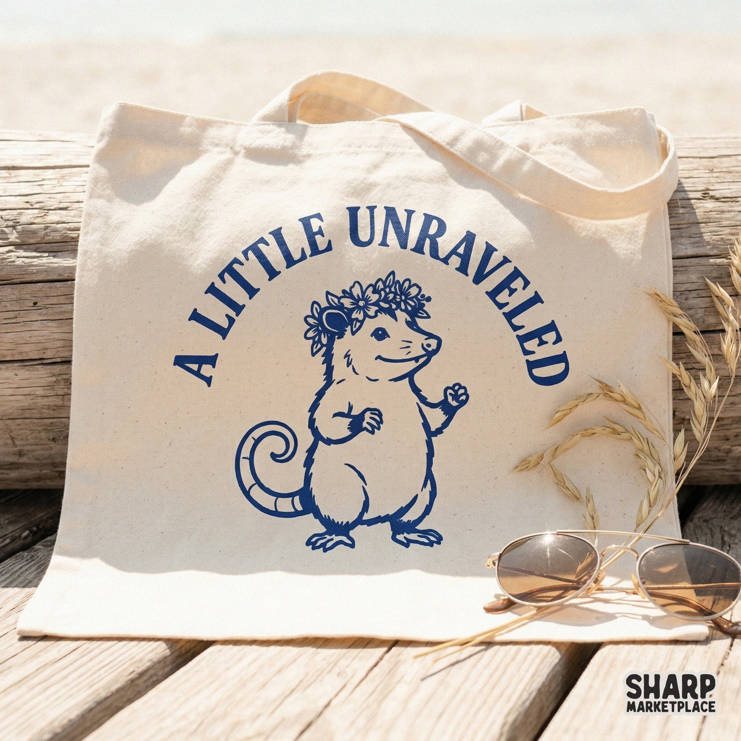 Whimsical floral opossum illustration in navy blue line art with the text A Little Unraveled, suitable for DIY home decor, tumblers, and print projects.