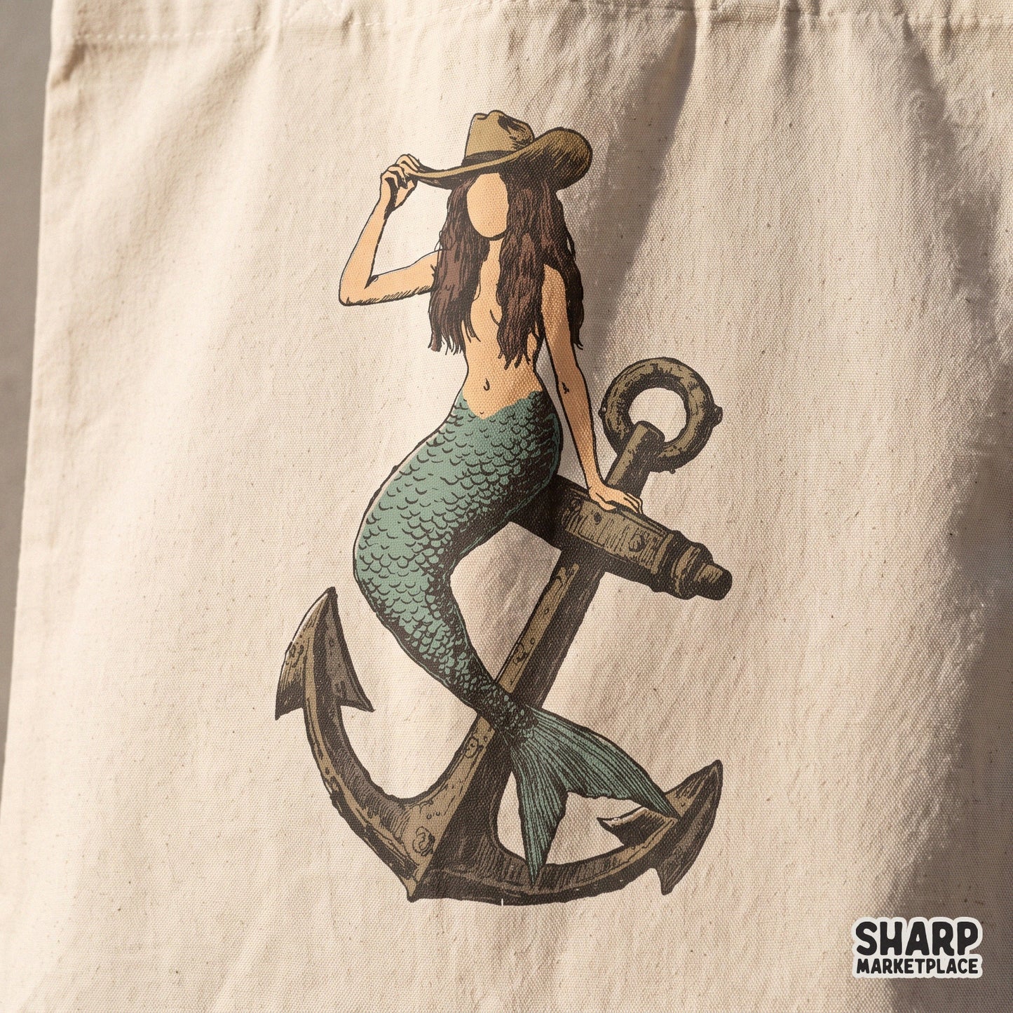 Vintage coastal cowgirl mermaid sitting on an anchor sublimation graphic for retro summer beach shirts