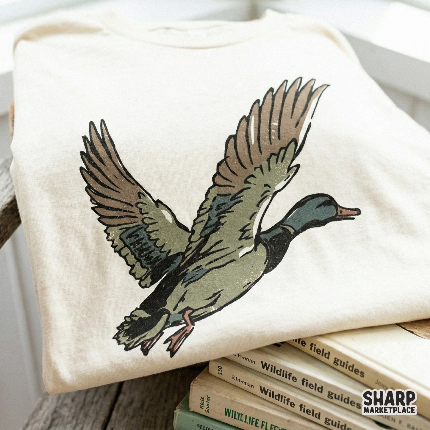 Detailed waterfowl art featuring a mallard duck in flight with a vintage aesthetic suitable for stickers, tumblers, and personalized hunting gifts.