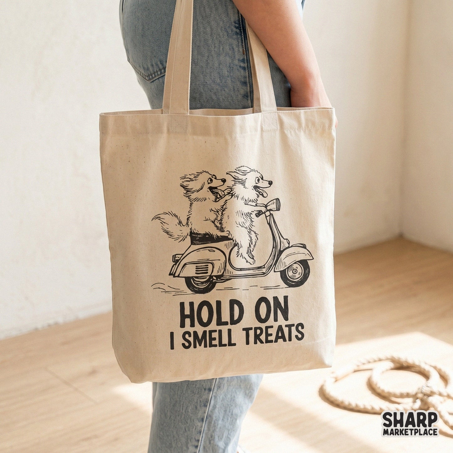 Hand-drawn style graphic of two dogs on a scooter with bold typography saying Hold On I Smell Treats, suitable for print-on-demand and sublimation.