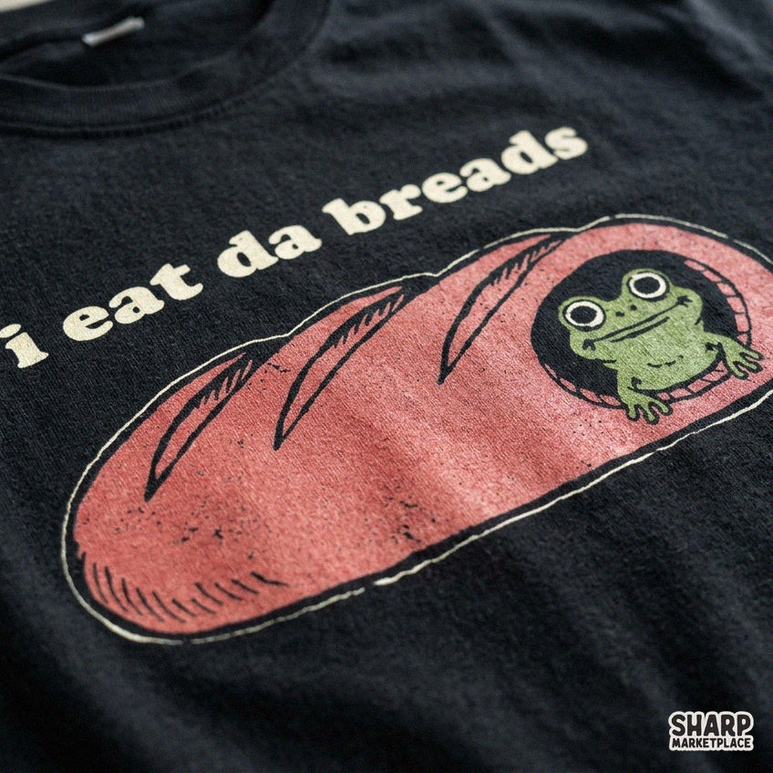 Whimsical funny frog in a baguette loaf sublimation PNG design for shirts and DTF prints