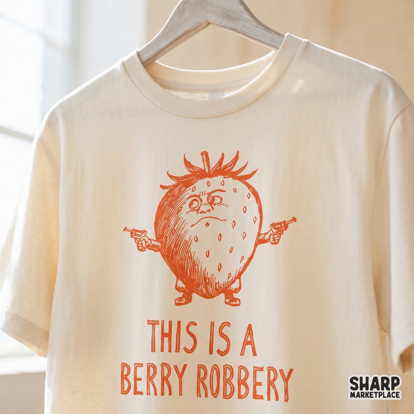 Playful strawberry outlaw graphic with a vintage aesthetic and distressed text, suitable for creative sublimation transfers and quirky DIY gift projects.