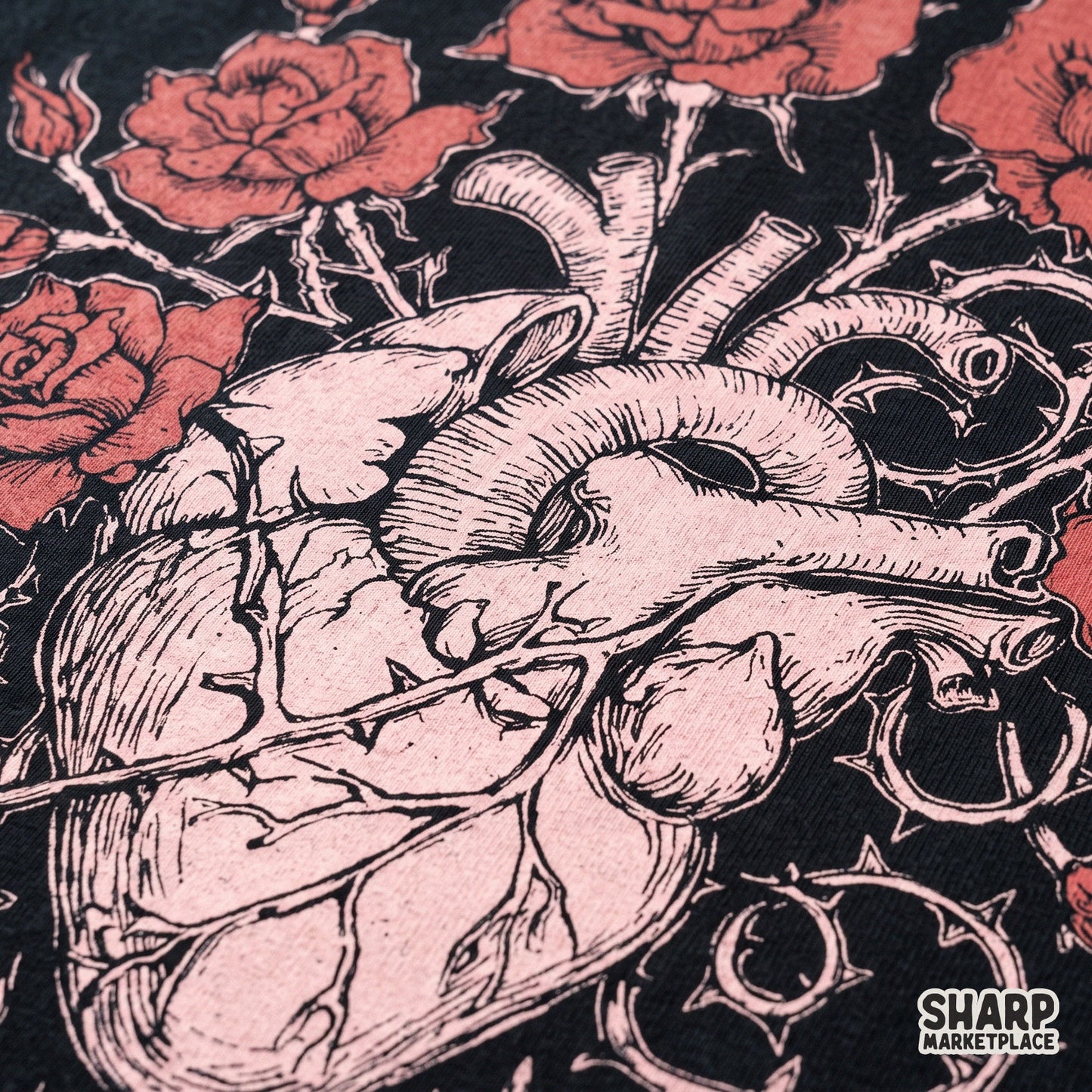 Anatomical bleeding heart with thorny roses in a gothic romance tattoo style for a Valentines Day png shirt design