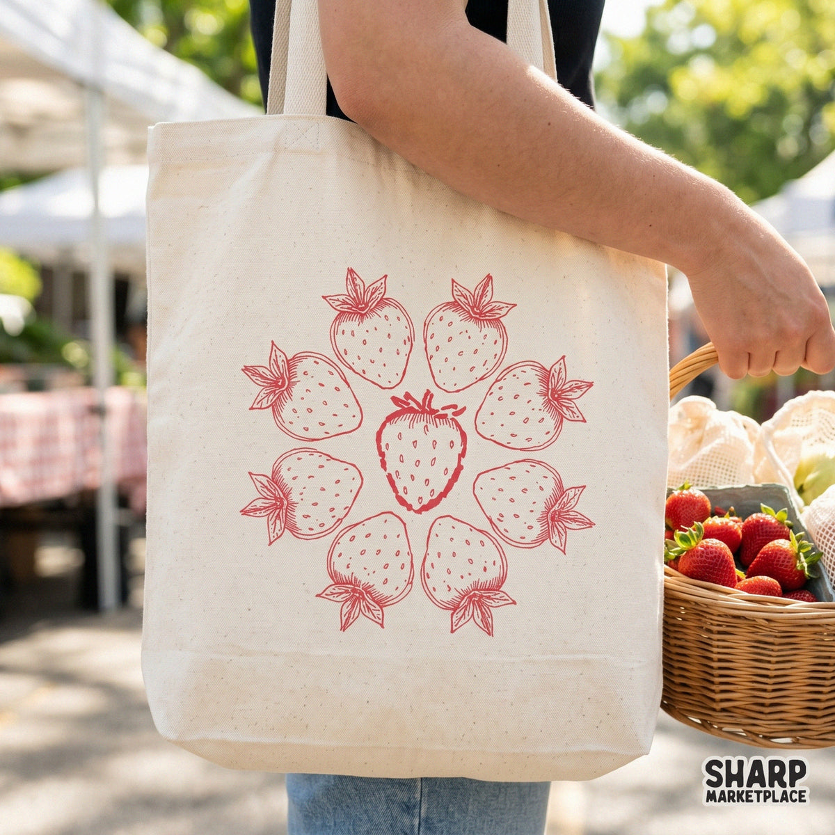 Minimalist red strawberry circle graphic on a canvas tote bag, perfect for summer-themed sublimation transfers and DIY fruit-inspired apparel.