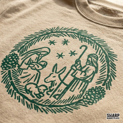 Vintage linocut Nativity scene holy family inside a pine wreath Christmas PNG sublimation design for shirts and decor