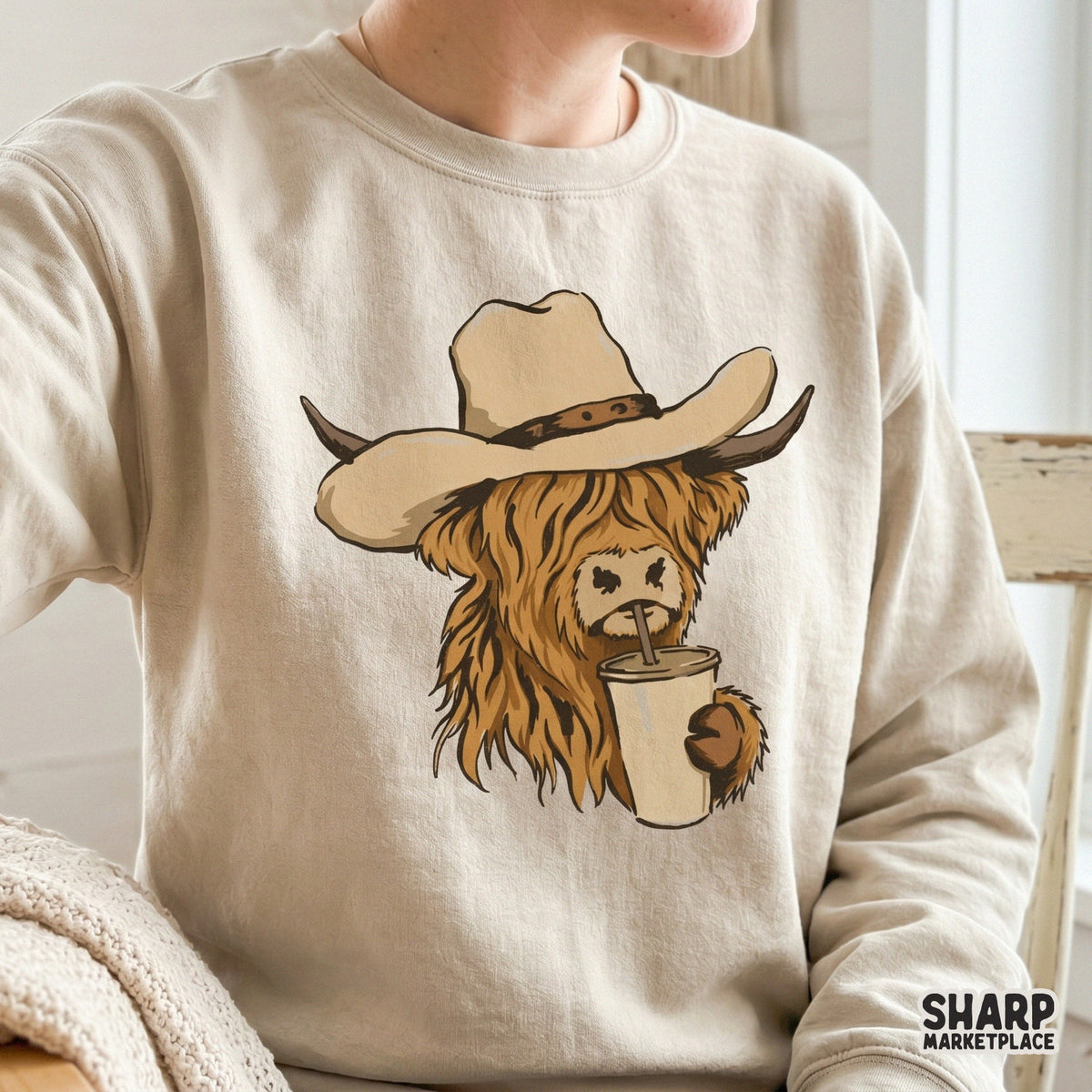 Detailed brown highland cow character wearing a cowboy hat and holding a coffee cup, ideal for DIY sublimation projects, tumblers, and trendy ranch art.