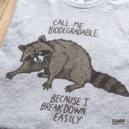 Sarcastic funny raccoon design with Call Me Biodegradable quote for sublimation printing and t-shirt designs PNG