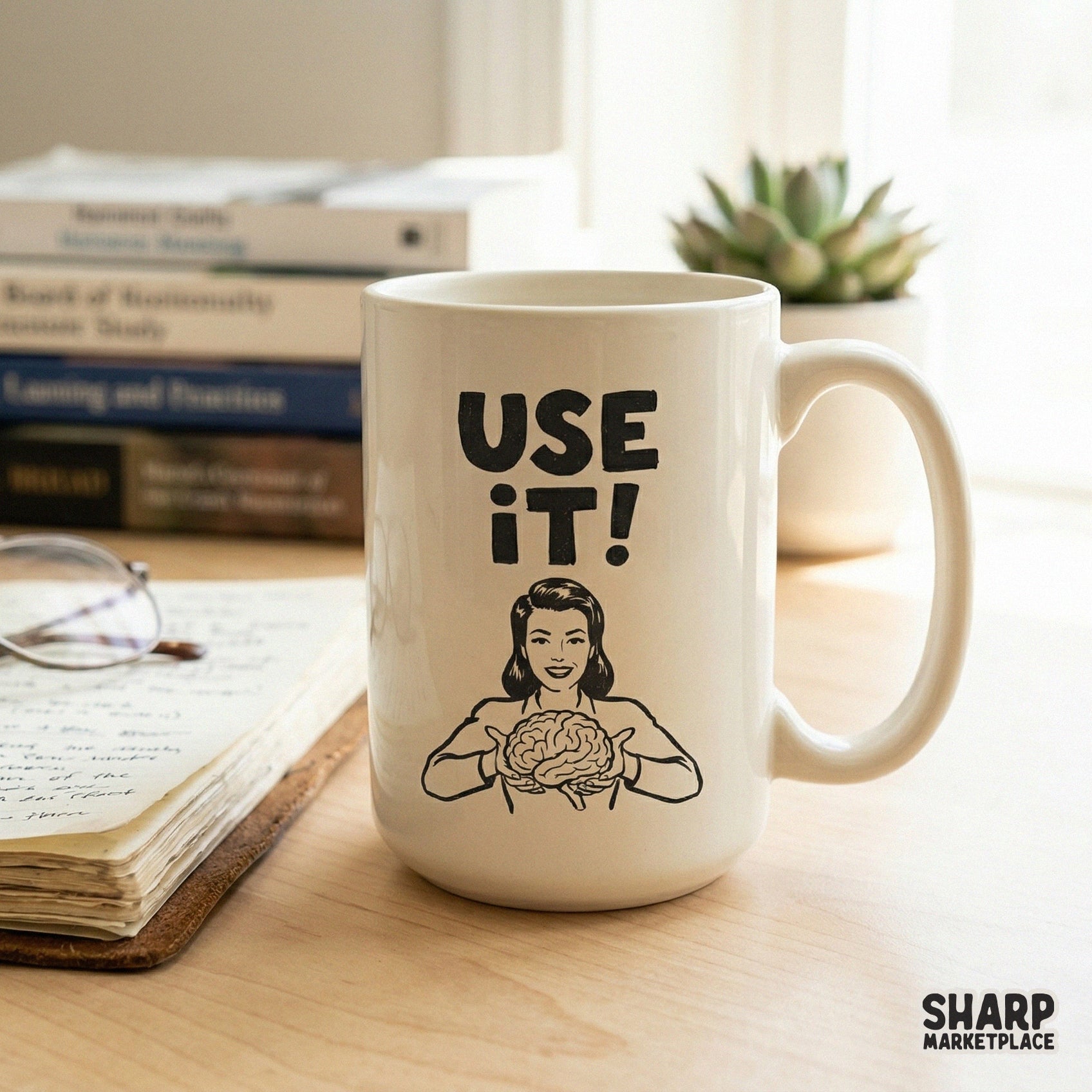 A ceramic coffee mug displaying a vintage-style illustration of a woman holding a brain with the bold text Use It! for funny teacher or nurse gifts.