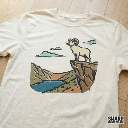 Hand-drawn bighorn sheep illustration with a distressed screen-print aesthetic, perfect for nature-themed sublimation transfers and stickers.