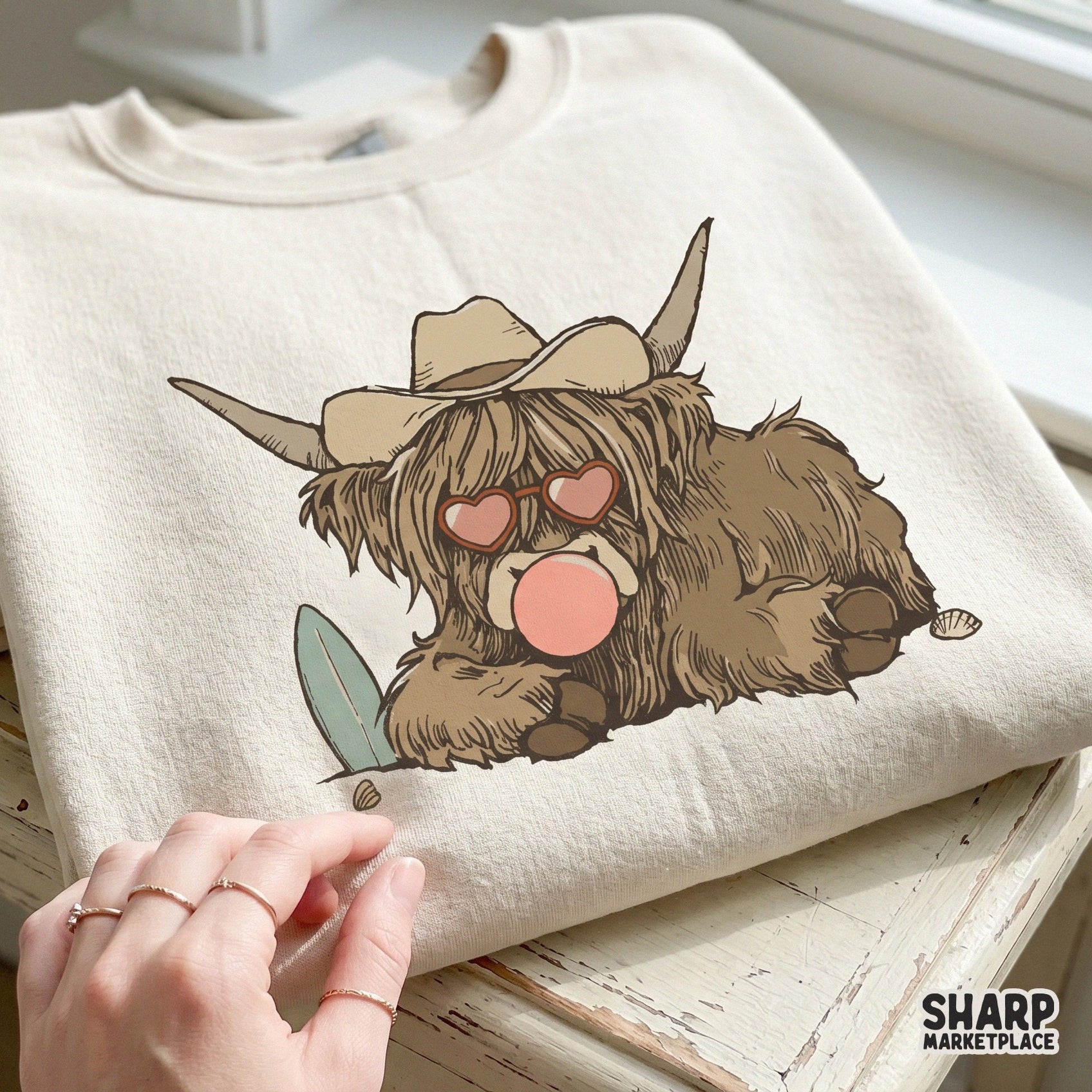Summer-themed highland cow digital download with a surfboard and cowboy hat, perfect for print-on-demand shirts and creative craft projects.