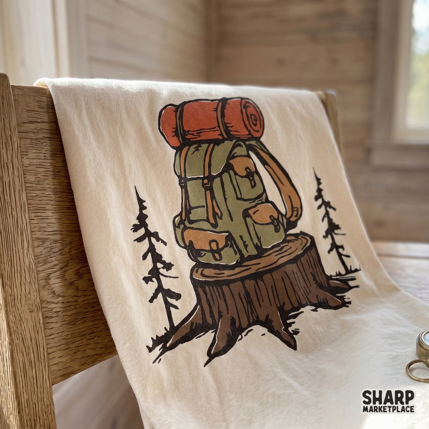 Digital design of a hiking backpack on a tree stump, featuring earthy green and orange tones, perfect for custom t-shirt sublimation or stickers.