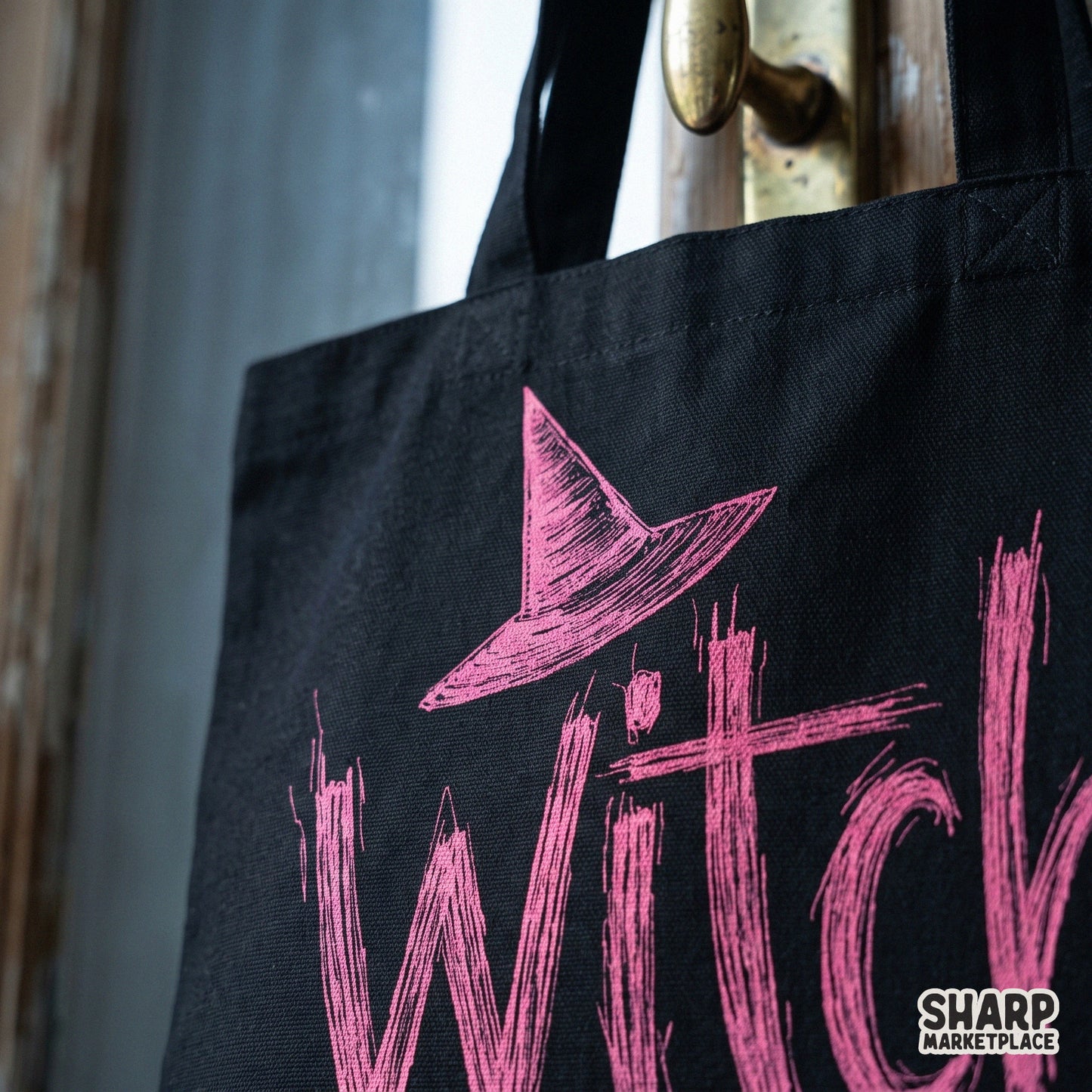 Retro pink witch hat sublimation design with spooky grunge lettering for Halloween apparel and fall crafts
