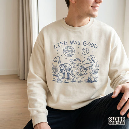 Whimsical hand-drawn dinosaur graphic in blue ink style, suitable for creating trendy stickers, tumblers, or retro-inspired wall art prints.