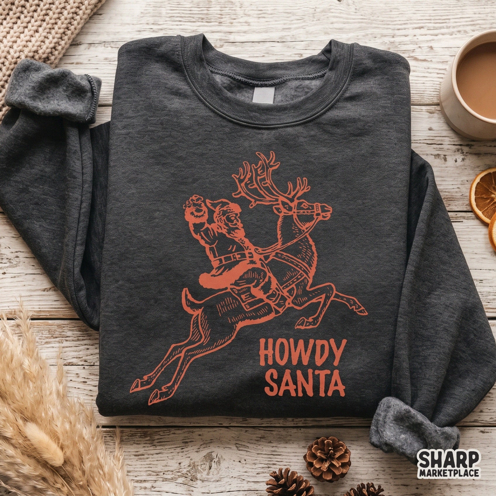 Howdy Santa cowboy graphic with a retro holiday reindeer design for western Christmas sublimation apparel designs