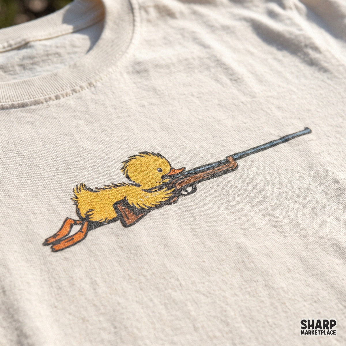Funny sniper duckling aiming a rifle in prone position digital PNG design for hunting t-shirts and outdoor gear