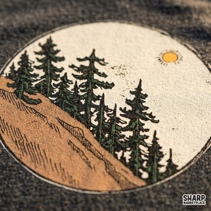 Vintage circle graphic with pine trees and rocky slope for camping lake life sublimation designs