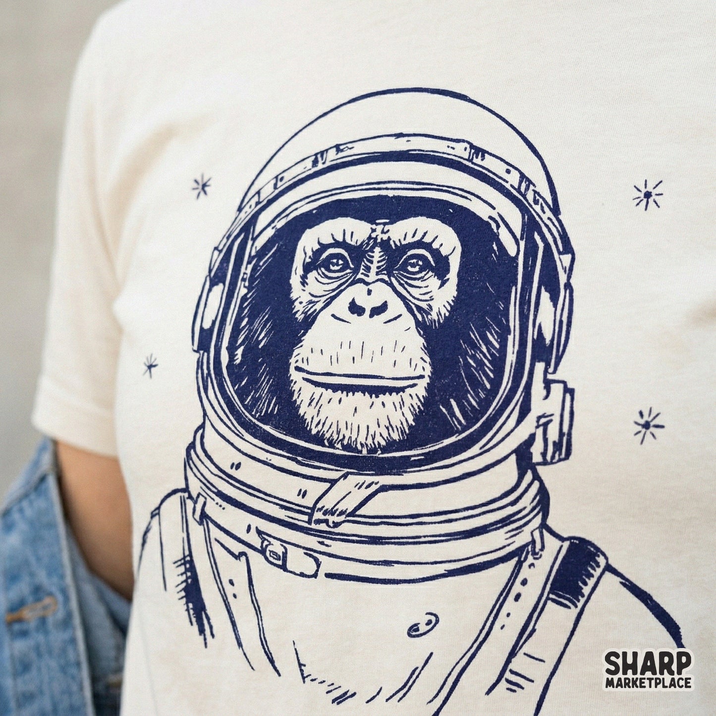 Monochromatic navy blue sketch of a chimpanzee astronaut surrounded by stars, a versatile digital design for print-on-demand apparel and sublimation transfers.