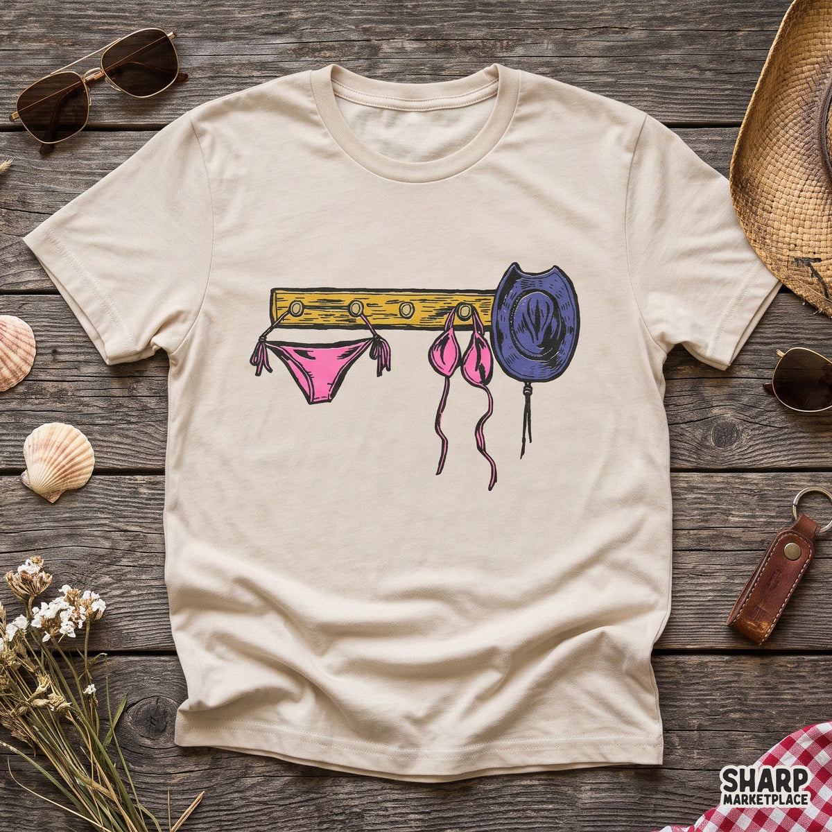 Vintage coastal cowgirl pink bikini on a wall rack for summer western shirts and sublimation PNG projects