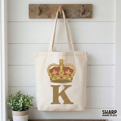 Vintage-inspired royal monogram design featuring a golden letter K and a jeweled crown, perfect for personalized tumblers, stickers, and wall art.