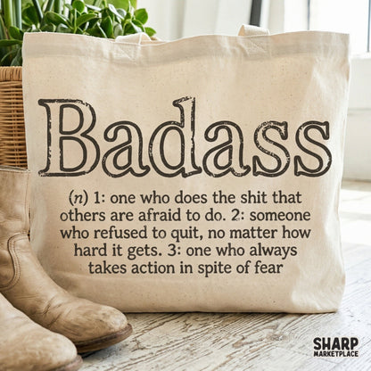Digital typography design for apparel featuring a sarcastic and bold definition of Badass in a vintage, distressed typewriter font style.