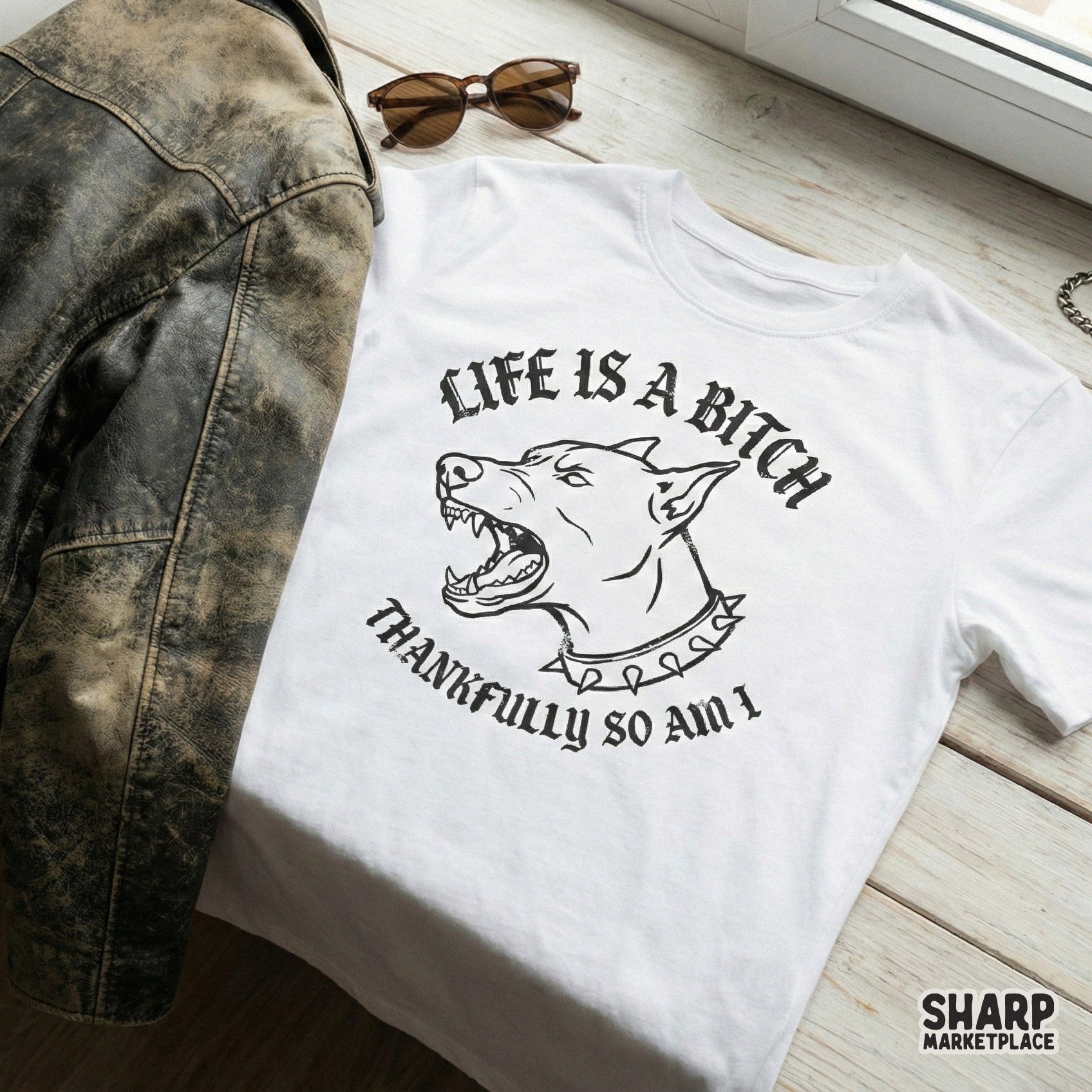 Gritty hand-drawn dog graphic with a spiked collar and bold arched lettering suitable for punk-inspired t-shirts, stickers, or tumblers.