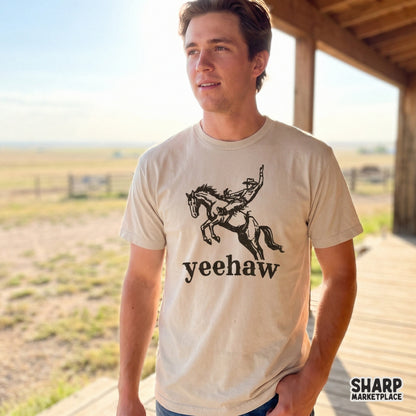 Western themed printable design showing a cowboy mid-buck on a horse with vintage ink texture and bold text, suitable for stickers or apparel transfers.