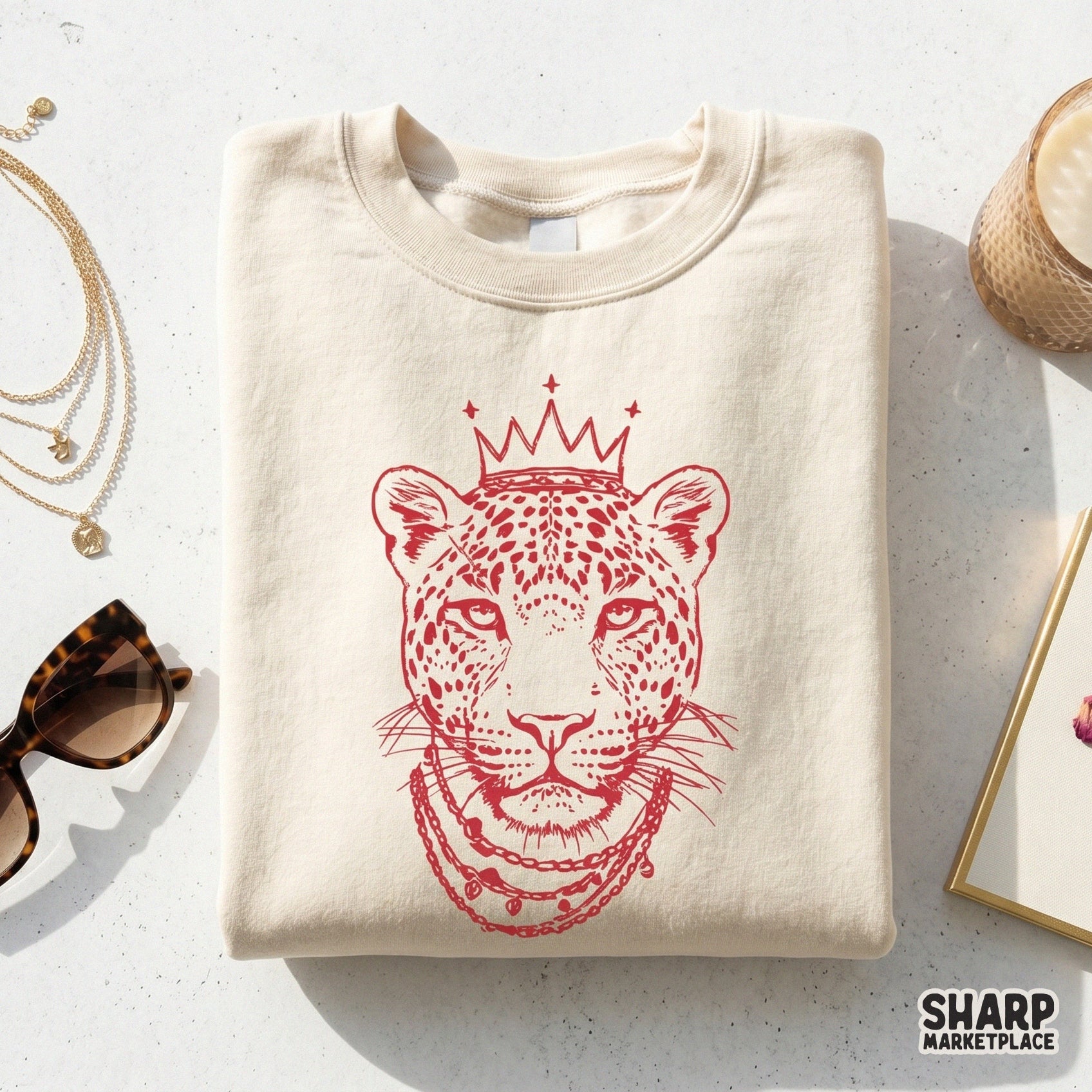 Hand-drawn leopard portrait in a trendy red sketch style with crown and jewelry, ideal for custom graphic tees, stickers, and DIY sublimation projects.