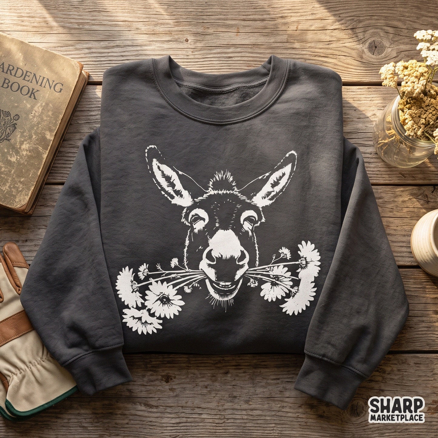 Vintage smiling donkey face sketch with daisies for animal lovers, cute retro farm animal sublimation design for t-shirts
