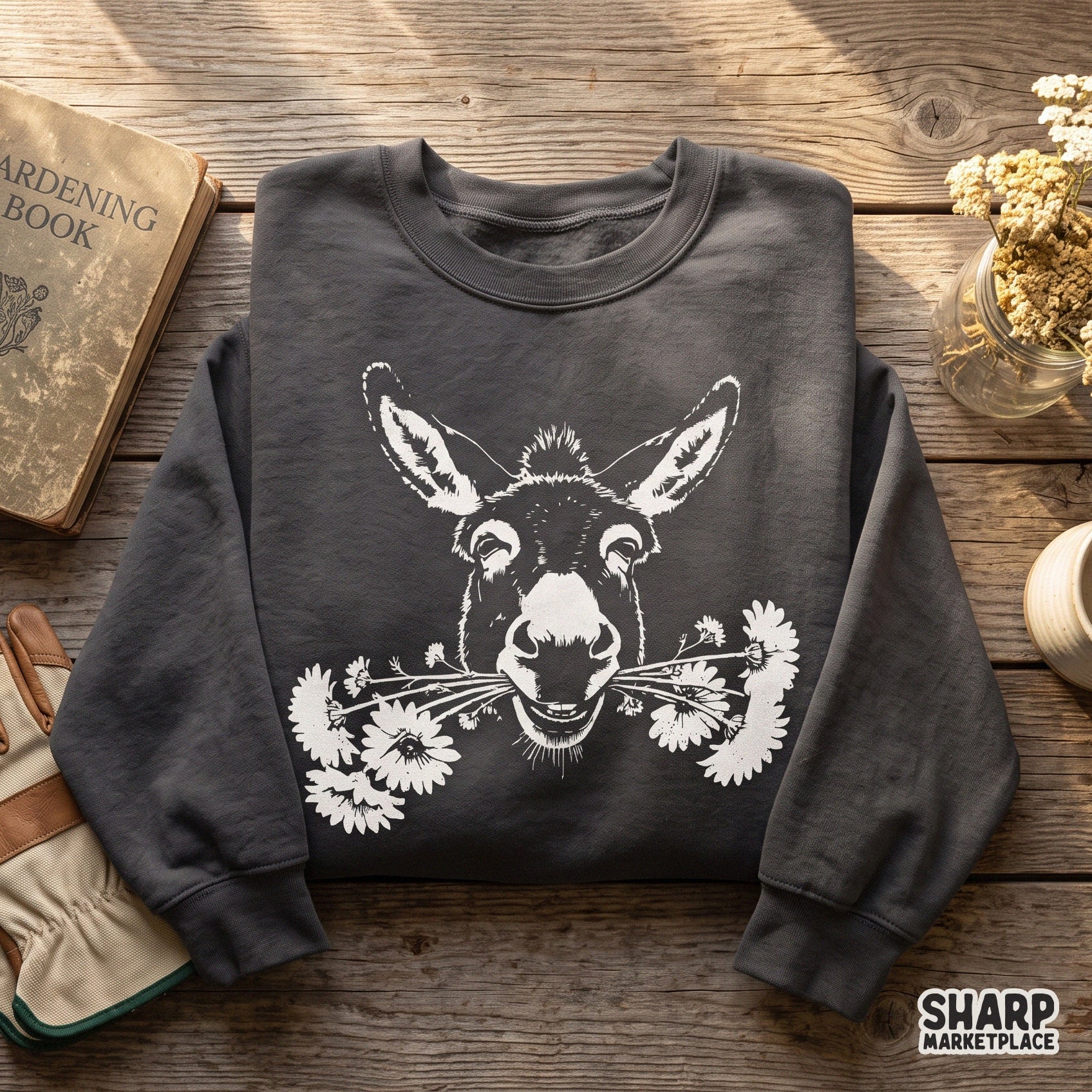 Vintage smiling donkey face sketch with daisies for animal lovers, cute retro farm animal sublimation design for t-shirts