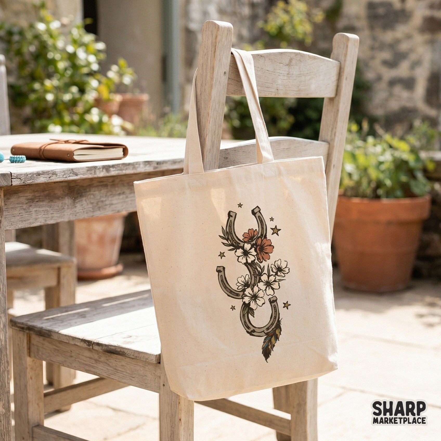 Rustic western horseshoe and wildflower charm graphic featuring a feather and star accents, suitable for sublimation transfers and DIY craft projects.