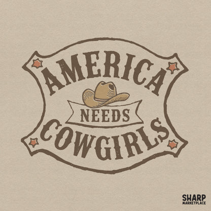 Vintage western badge design featuring a cowboy hat and the text America Needs Cowgirls in retro arched typography with distressed brown and tan colors.