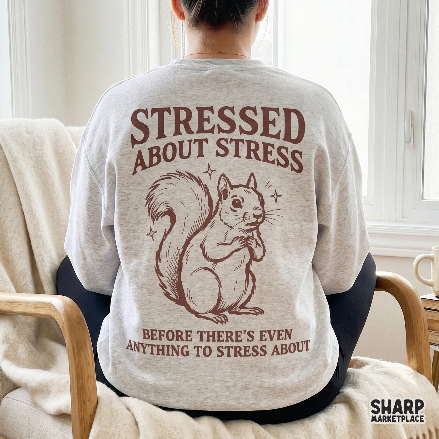 Maroon and sepia digital illustration of a wide-eyed squirrel with the text Stressed About Stress Before There’s Even Anything To Stress About.