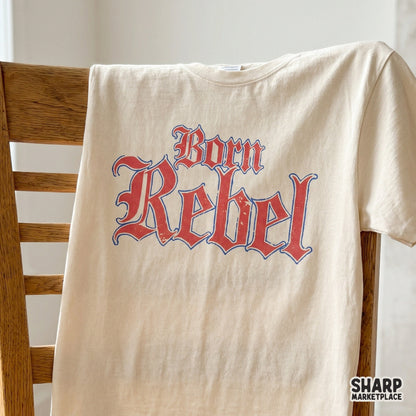 Bold Born Rebel typography in a distressed red and blue gothic font, suitable for sublimation transfers, custom stickers, and rugged apparel designs.
